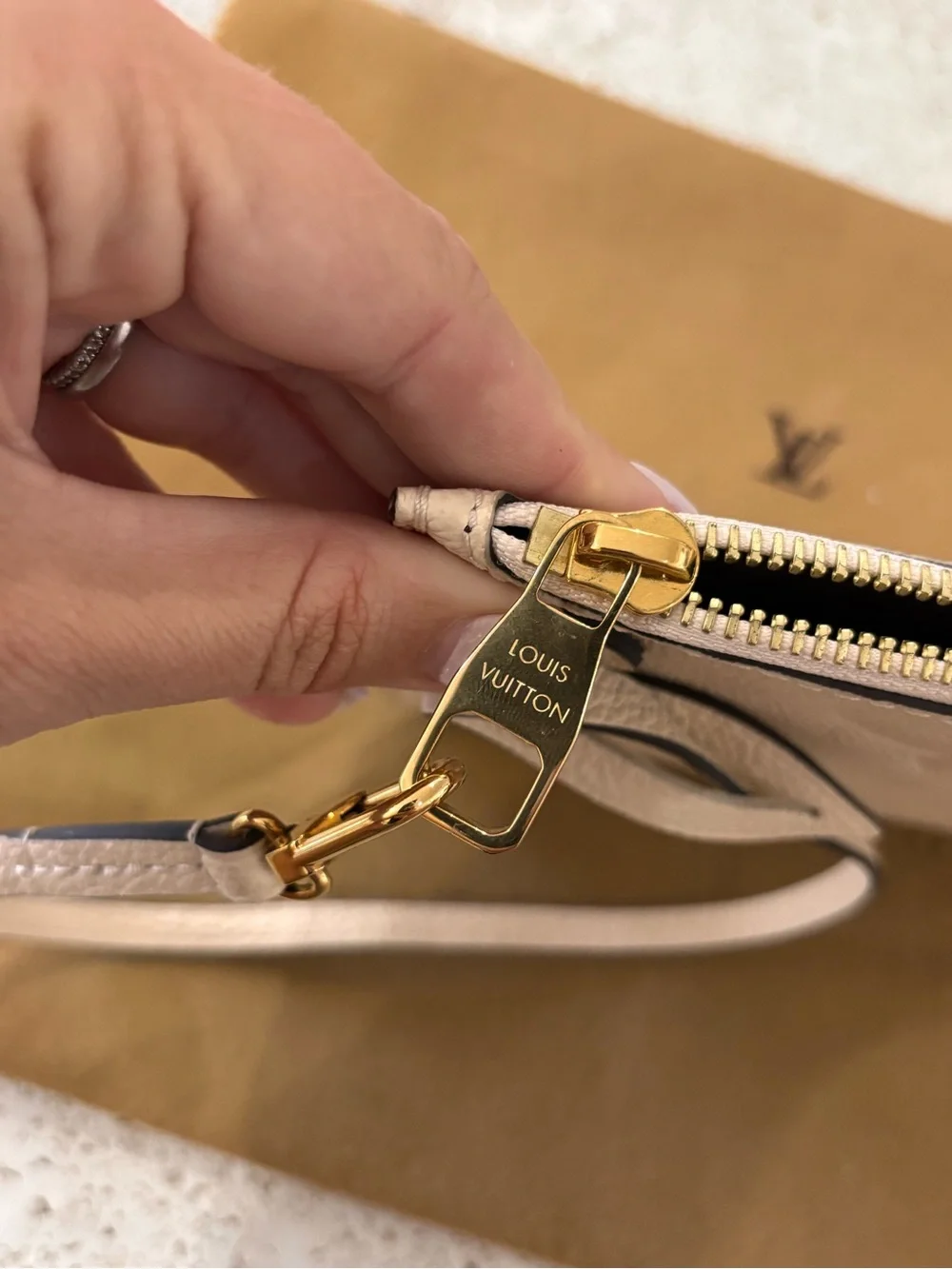 Authentic Louis Vuitton Neverfull GM Empreinte cream monogram pouch wristlet